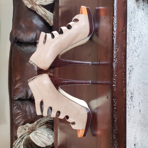 Platform tan booties with 6 buckle straps & a fun pop of orange under toes! - Picture 5 of 7